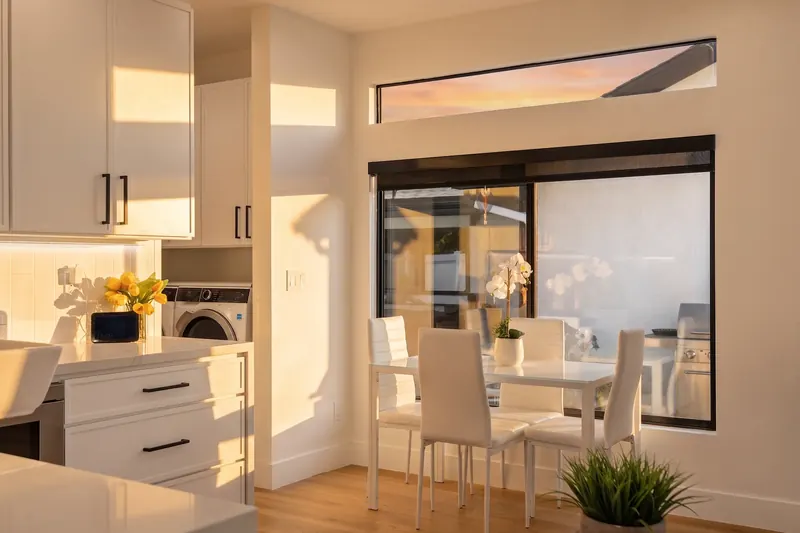 Open kitchen and dining area inside a completed H&A ADU.